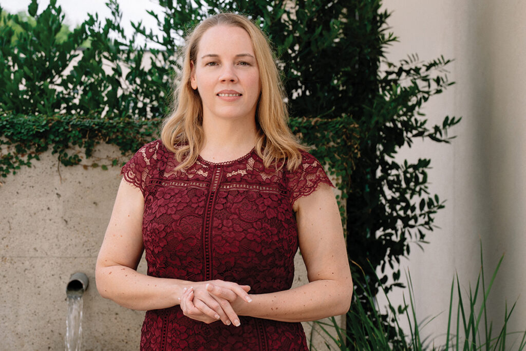 Female, blonde, burgundy dress