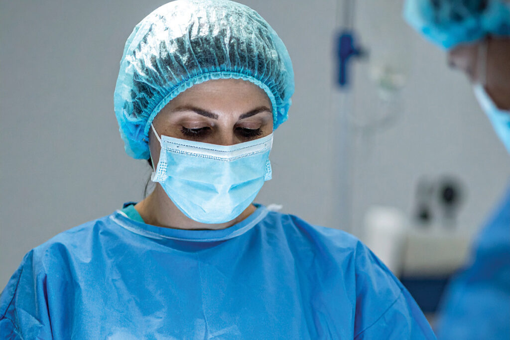 Female surgeon in the operating room photo