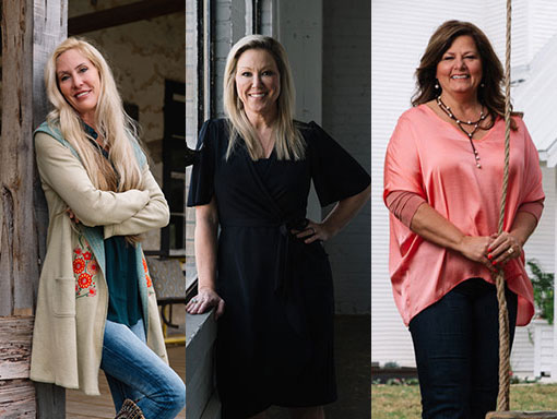 The three women in the featured article standing and smiling at the camera
