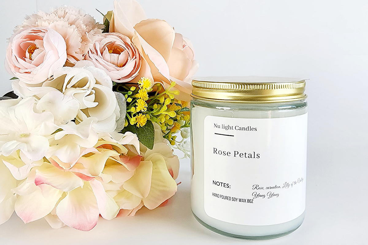 White candle with roses White candle with roses